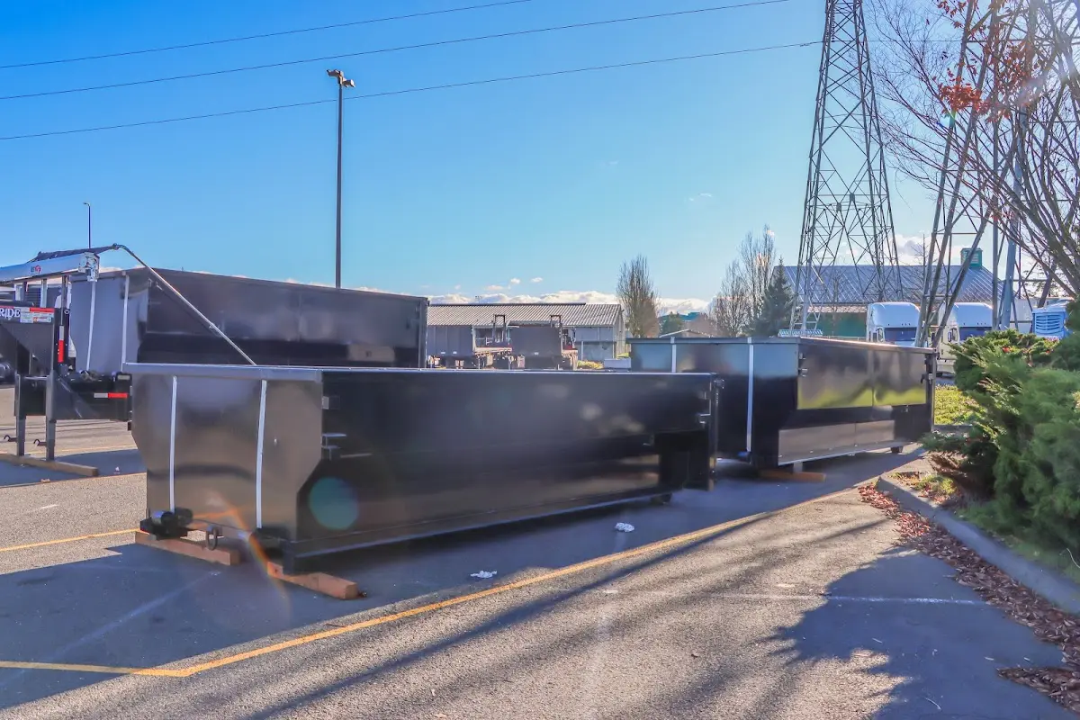 Roll-off dumpster ready for waste disposal at job site for Roofing Dumpster Rental in Mendon